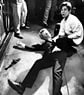 Juan Romero kneeling over Bobby Kennedys body