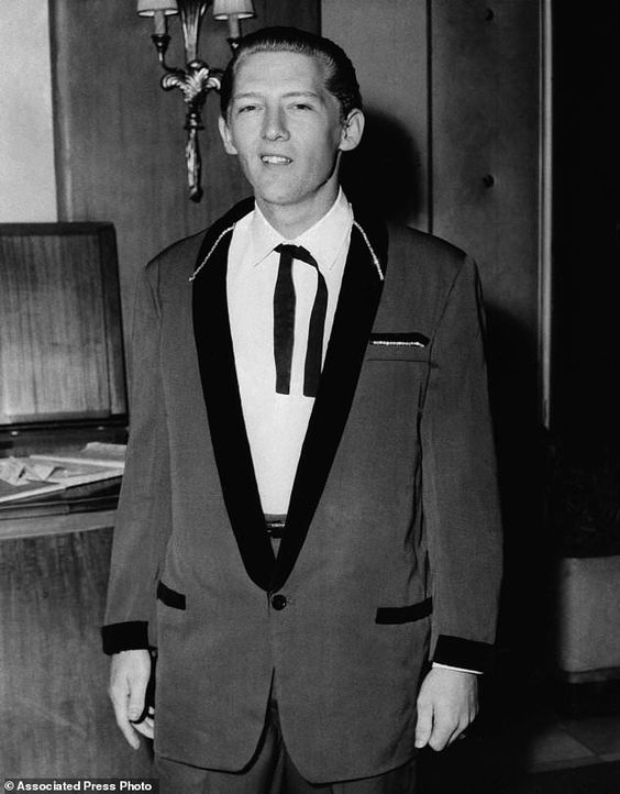 Jerry Lee in front of a mike.